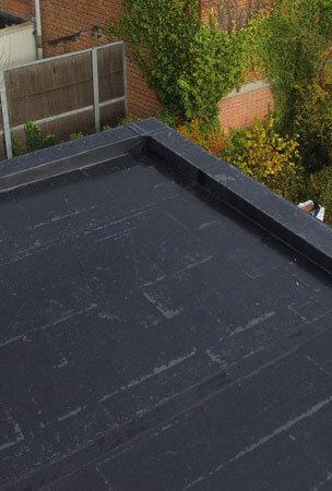 Black EPDM roofing membrane on flat domestic roof